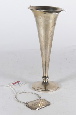 Lot 225 - A George V silver trumpet shaped spill vase,...