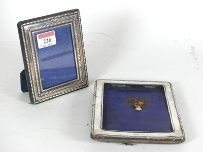 Lot 226 - An Edwardian silver clad easel photograph...