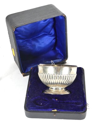 Lot 227 - A George V silver bowl, of half-reeded...
