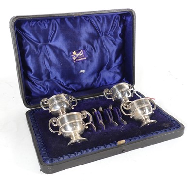 Lot 228 - A set of four late Victorian silver open salts,...