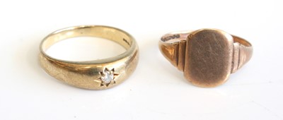 Lot 277 - A gent's 9ct gold diamond solitaire ring set...