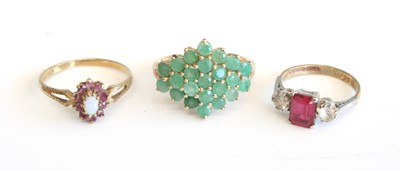 Lot 285 - A modern 9ct gold multi emerald set lozenge...