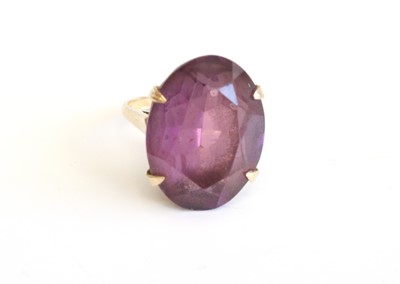 Lot 288 - A 9ct gold amethyst solitaire ring, the four...