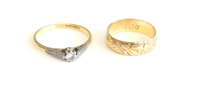 Lot 290 - An 18ct gold and platinum diamond solitaire...