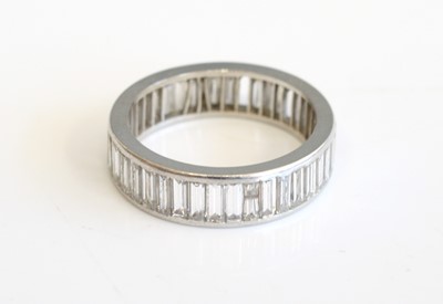 Lot 291 - A white metal diamond eternity ring, the 5.7mm...