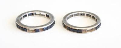 Lot 292 - A pair of 14ct white gold and sapphire set...