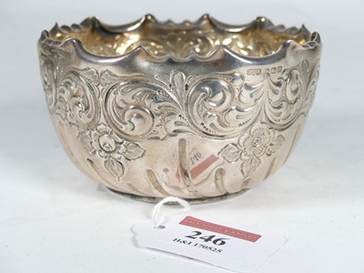 Lot 246 - An Edwardian silver sugar bowl having a shaped...