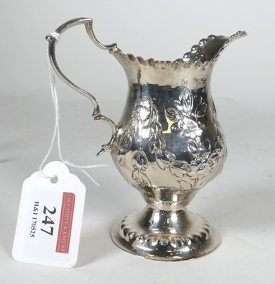Lot 247 - A 19th century silver cream jug of helmet...