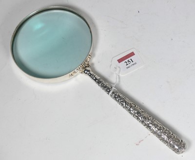 Lot 251 - An early 20th century oversized magnifying...
