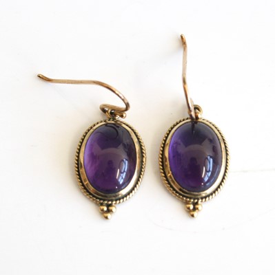 Lot 313 - A pair of 9ct gold and cabochon amethyst set...