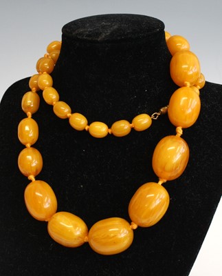 Lot 321 - A beaded faux butterscotch amber necklace...