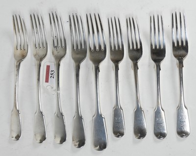 Lot 253 - A set of four Goerge III silver table forks in...