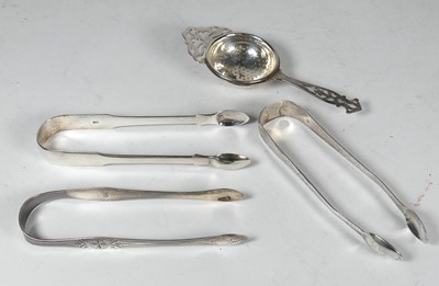 Lot 264 - A pair of George III silver sugar tongs of...