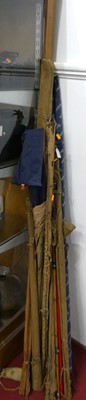 Lot 469 - A collection of fishing rods, to include split...