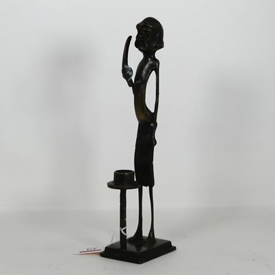 Lot 471 - A bronzed metal figural candlestick, h.29cm