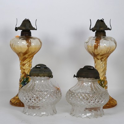 Lot 474 - A pair of late 19th century cut glass oil lamp...