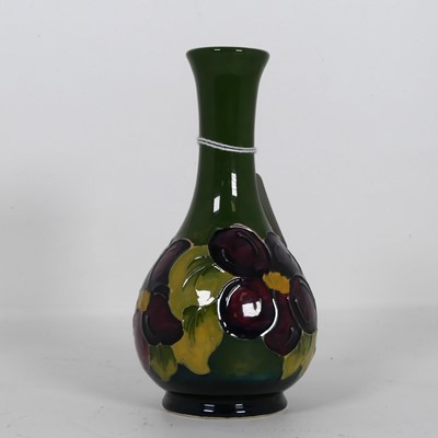 Lot 476 - A Moorcroft pottery bottle vase in the...