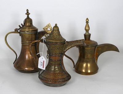 Lot 475 - A copper dallah coffee pot, of typical form,...