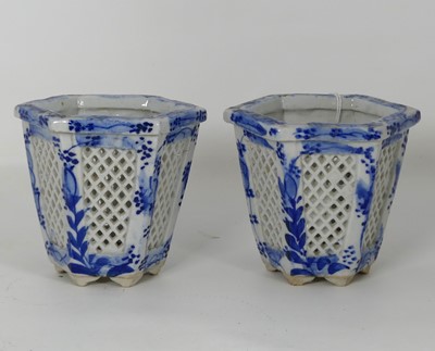 Lot 490 - A pair of Chinese porcelain reticulated vases,...