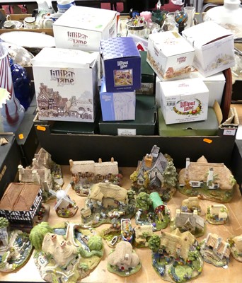 Lot 504 - A collection of Lilliput Lane model cottages,...