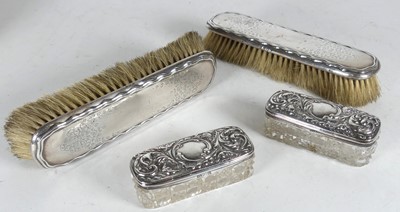 Lot 272 - A pair of George V silver backed clothes...