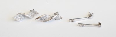 Lot 329 - A pair of modern 18ct white gold and diamond...
