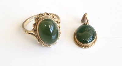 Lot 333 - A modern 9ct gold and cabochon nephrite set...