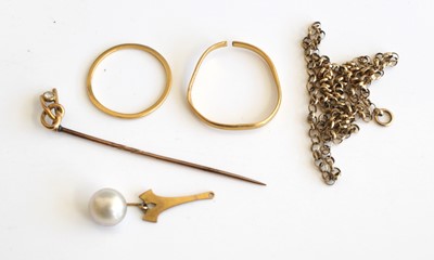 Lot 337 - A 22ct gold band ring (cut), together with one...