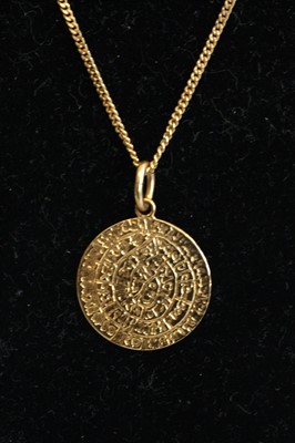 Lot 340 - A medieval style yellow metal pendant,...