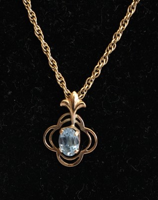 Lot 344 - A 9ct gold blue topaz set pendant on 9ct gold...