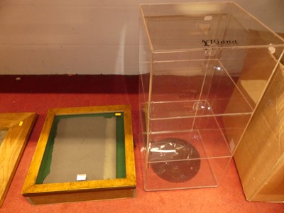 Lot 1073 - A beech wood glass topped table-top display...