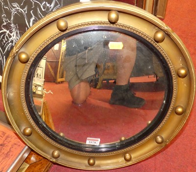 Lot 1078 - A gilt framed convex wall mirror, dia.39cm; a...