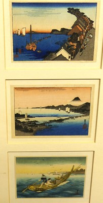 Lot 1100 - A set of three miniature Japanese woodblock...