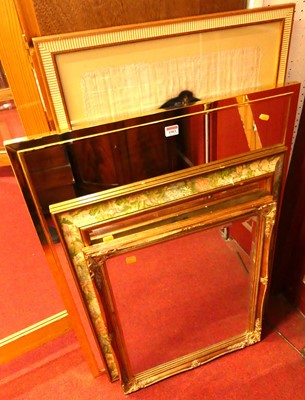 Lot 1083 - A gilt framed and bevelled rectangular wall...
