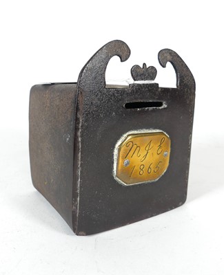 Lot 390 - A mid-19th century iron moneybox, having a...