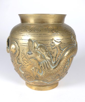 Lot 434 - A reproduction Chinese brass vase, relief...