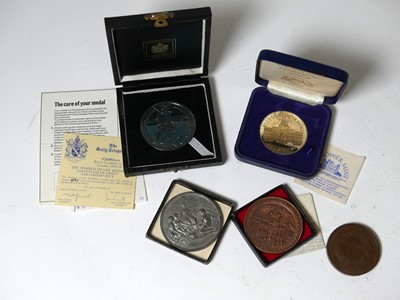Lot 441 - A collection of medals to include a silver...