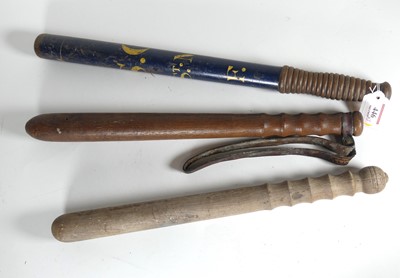 Lot 446 - An early 20th century painted wooden truncheon,...