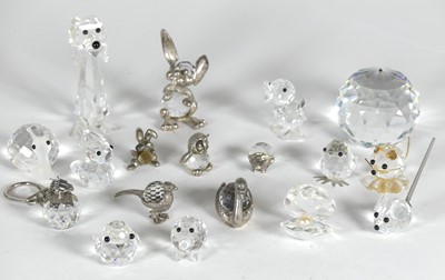 Lot 445 - A collection of crystal models of animals to...
