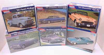 Lot 652 - A collection of six boxed Monogram 1/25 scale...