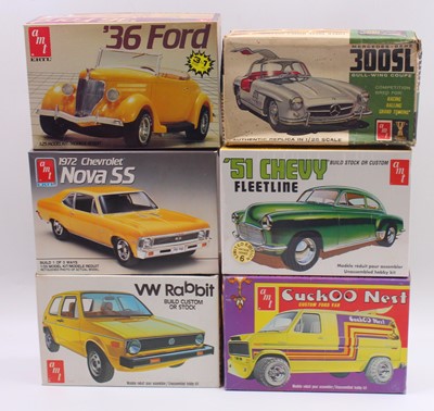 Lot 660 - A collection of six boxed AMT/Ertl 1/25 scale...
