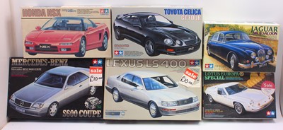 Lot 667 - A collection of Tamiya plastic mixed scale car...