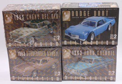 Lot 671 - Four boxed as issued AMT/Ertl 2000 Year...