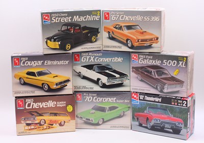 Lot 681 - A collection of eight boxed AMT/Ertl 1/25...