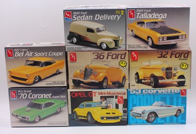 Lot 687 - A collection of eight boxed AMT/Ertl 1/24...