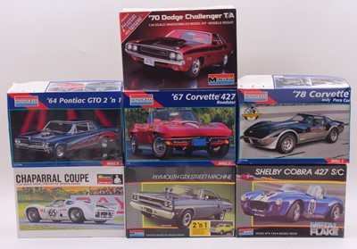Lot 694 - Seven boxed Monogram 1/24 scale plastic car...