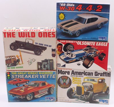 Lot 700 - Five boxed MPC 1/25 scale plastic car kits to...