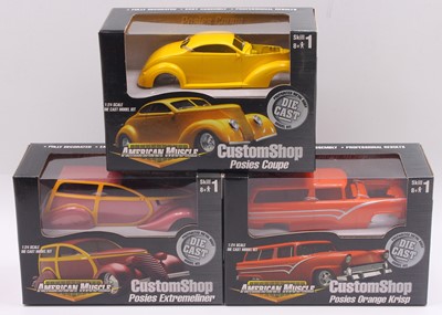 Lot 703 - Three boxed American Muscle 1/24 scale diecast...