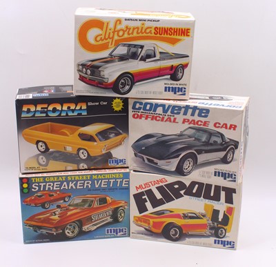 Lot 710 - Five boxed MPC/Ertl 1/25 scale plastic car...