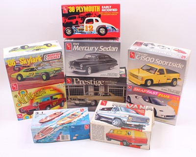 Lot 712 - A collection of nine boxed AMT/ERTL mixed...